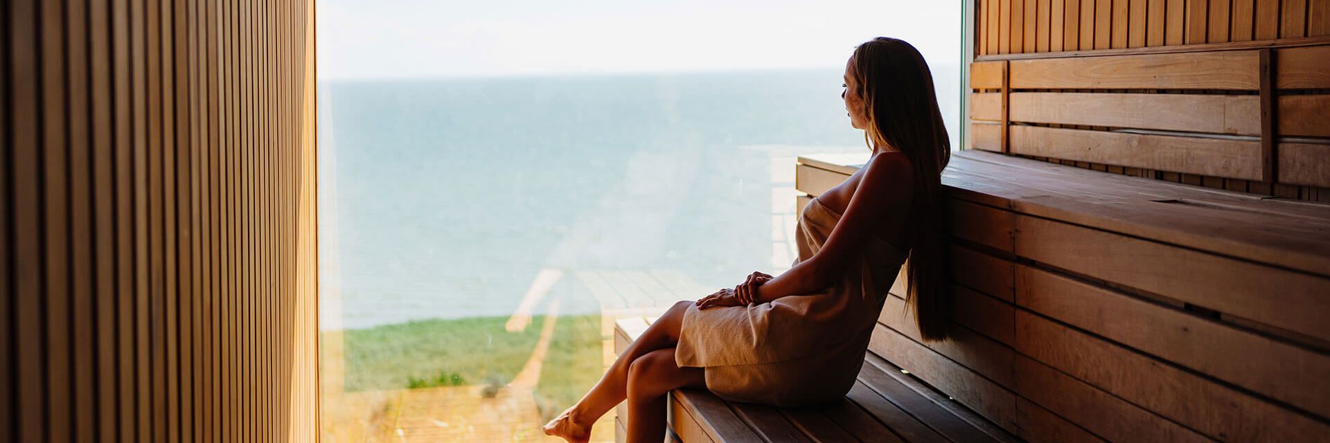 Girl sitting on wooden bench