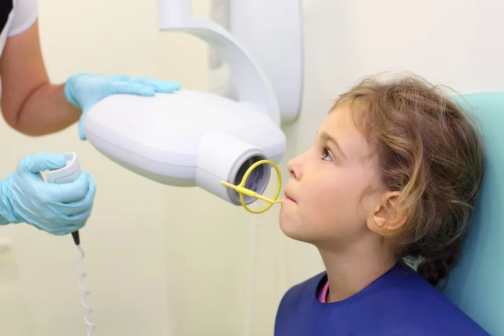 Dentist hands make jaw x-ray