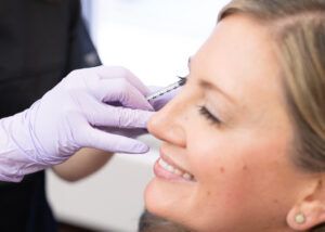 Patient smiling while getting treatment