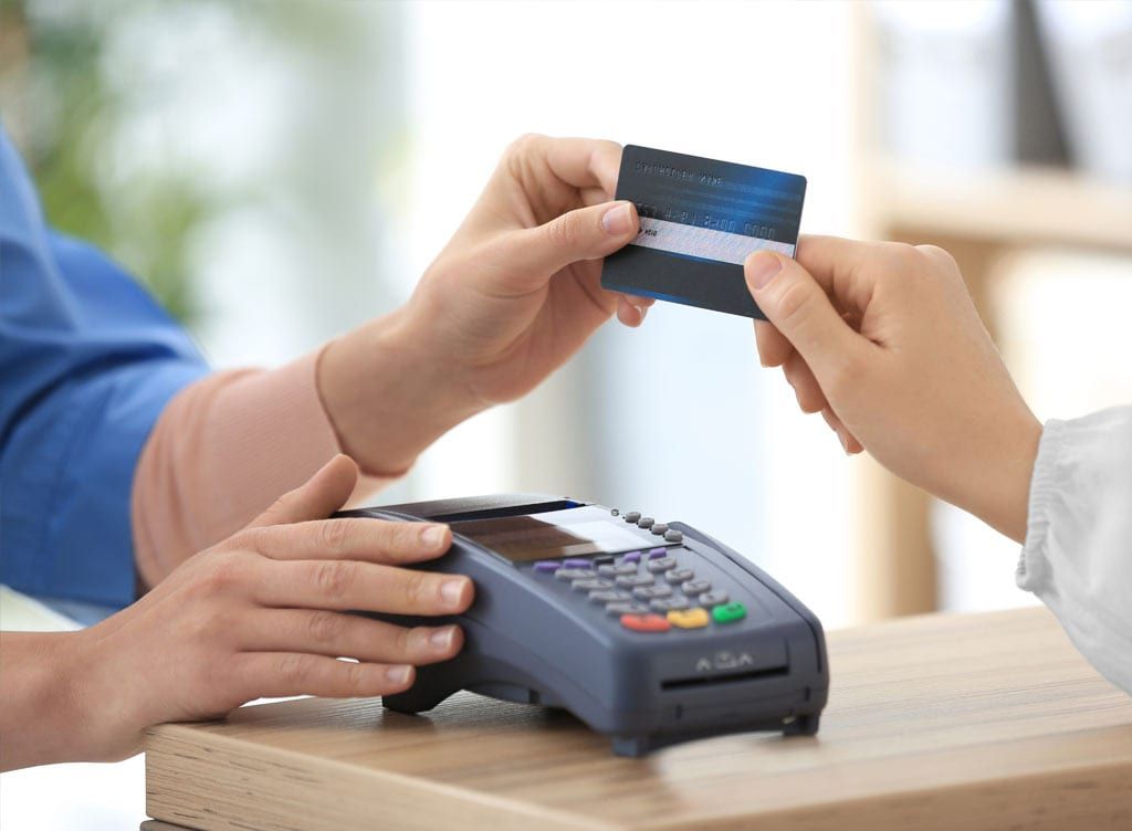 hands using credit card pay