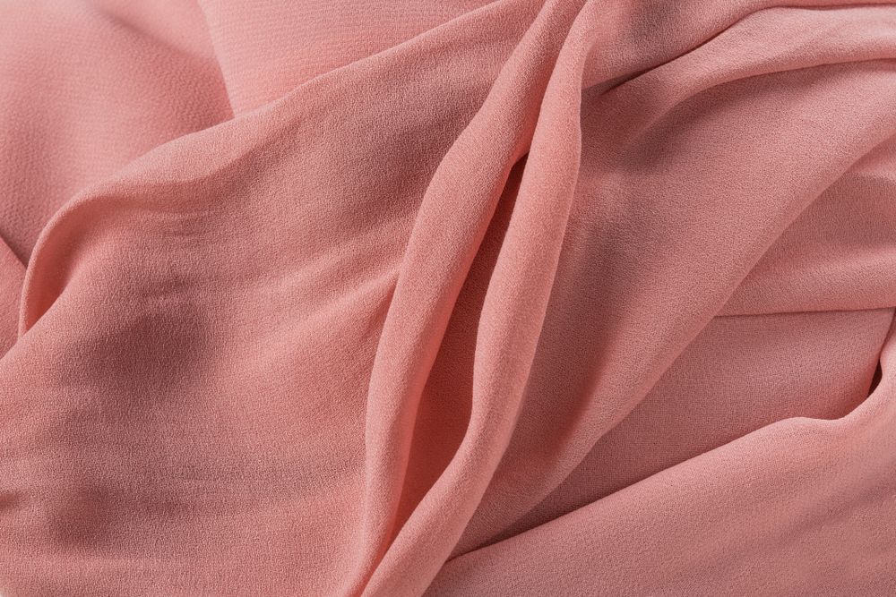 Soft,Pink,Fabric,Shaped,As,Female,Genital,Organs,,Vagina