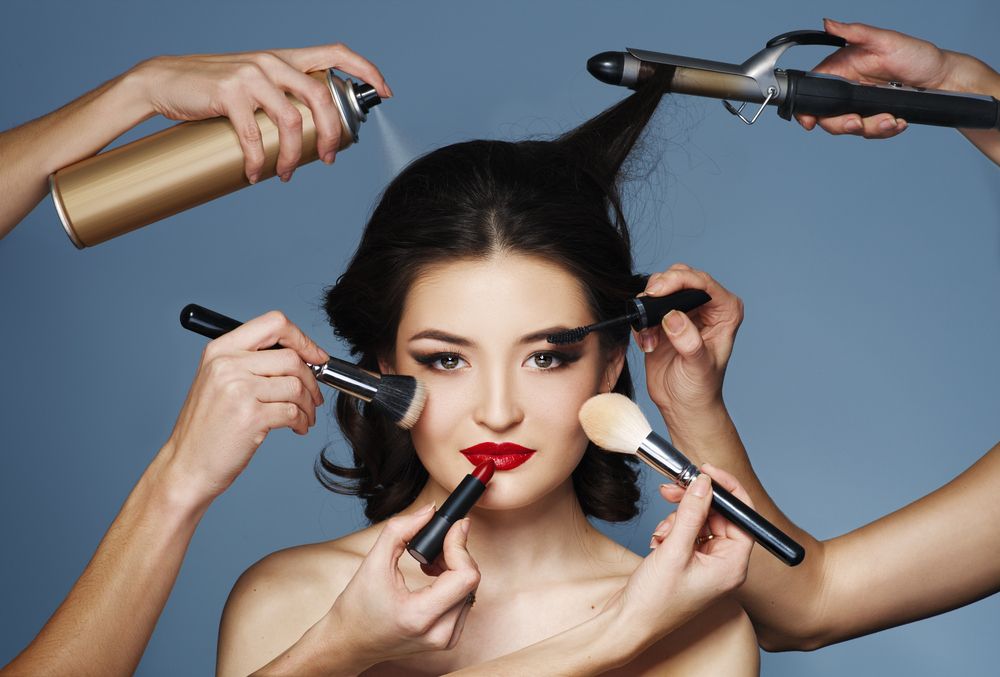 Many,Hands,With,Cosmetics,Brush,,Shadows,Doing,Make,Up,Of