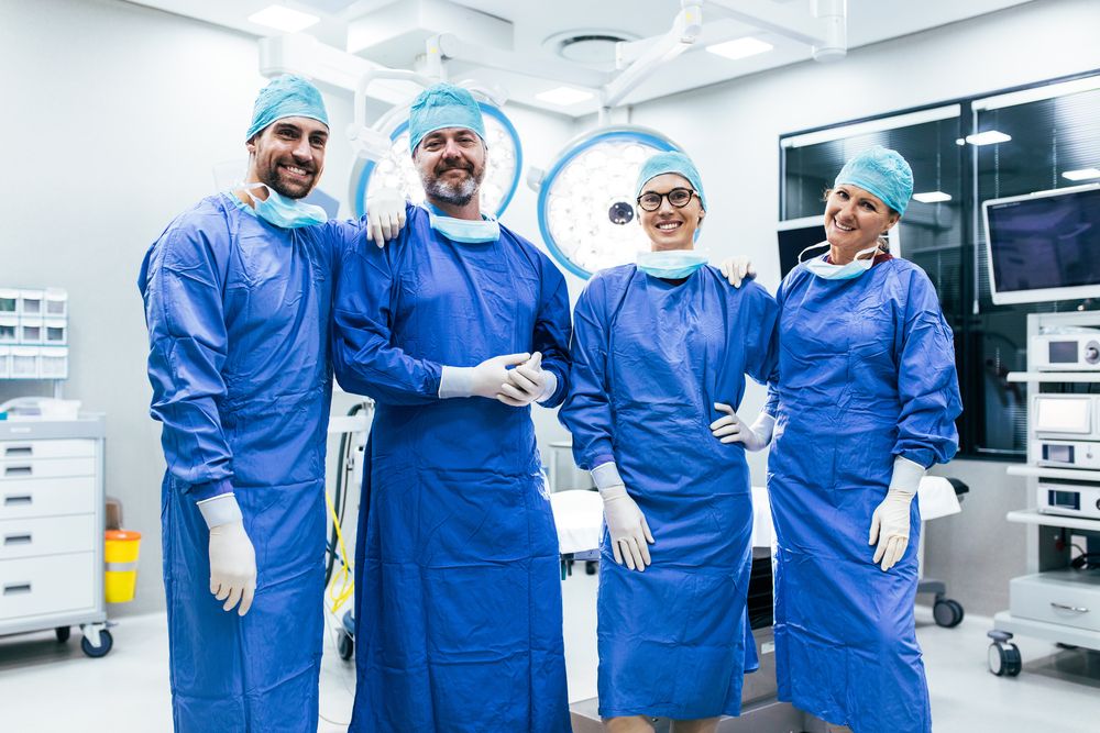 Portrait,Of,Successful,Medical,Workers,In,Surgical,Uniform,In,Operation