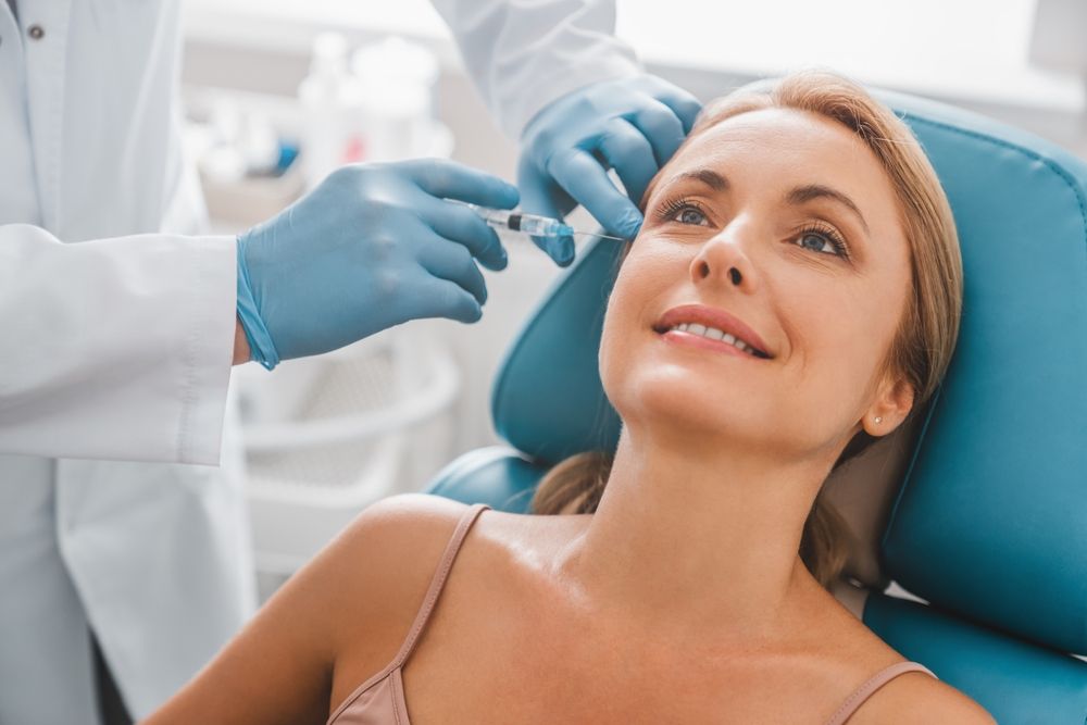 Beautiful,Middle,Aged,Woman,Get,Injection,In,Clinic.,Cosmetology,