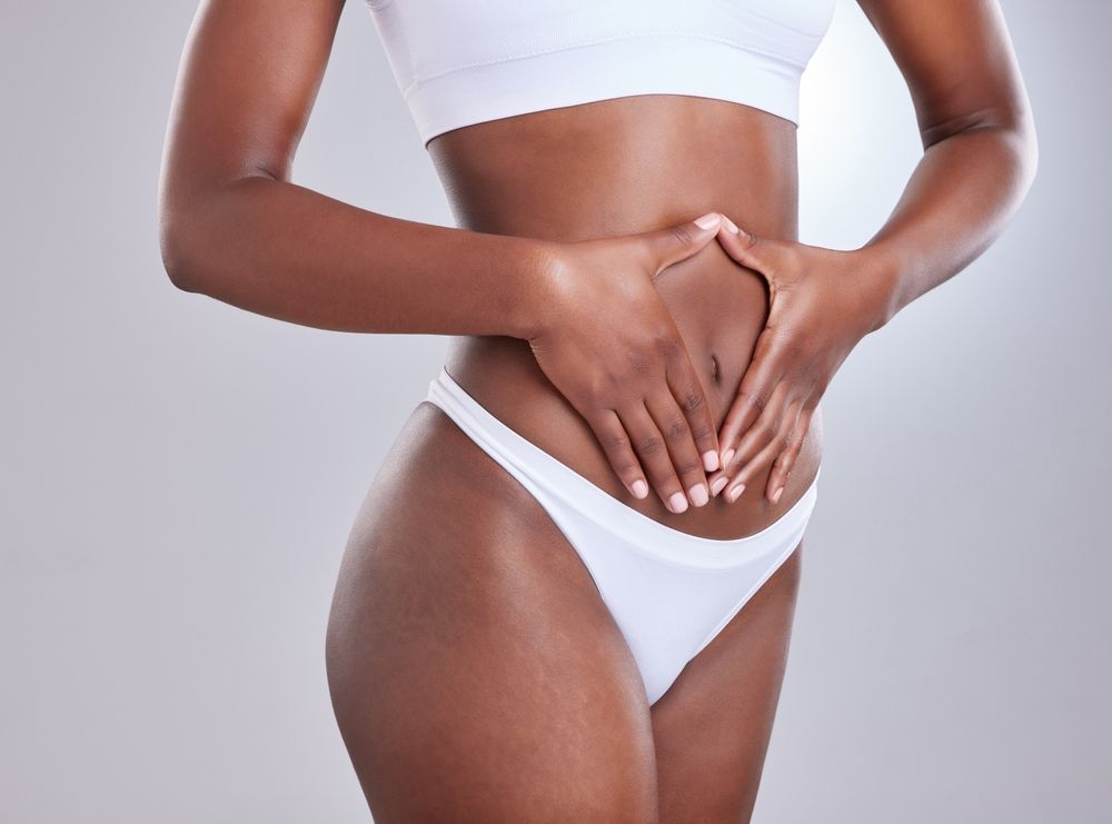 Woman,,Body,And,Hands,Frame,On,Stomach,For,Nutrition,,Beauty