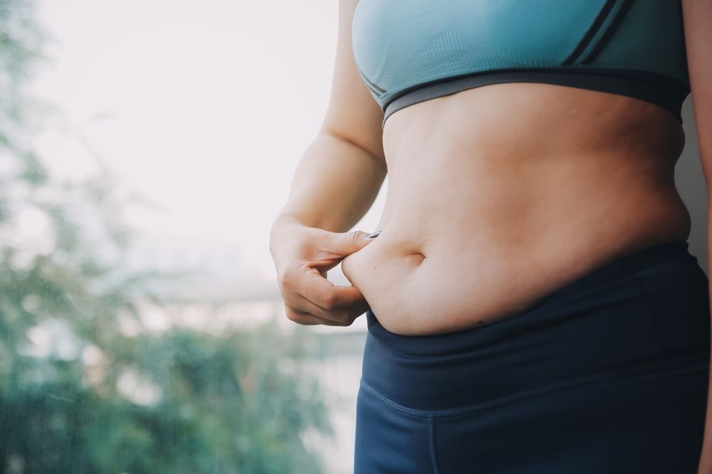 Fat,Woman,,Fat,Belly,,Chubby,,Obese,Woman,Hand,Holding,Excessive