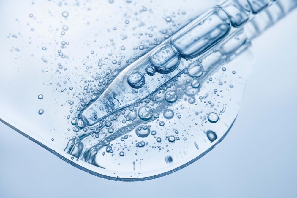 Liquid,Cool,Blue,Gel,Or,Serum,On,Blue,Glass,Of