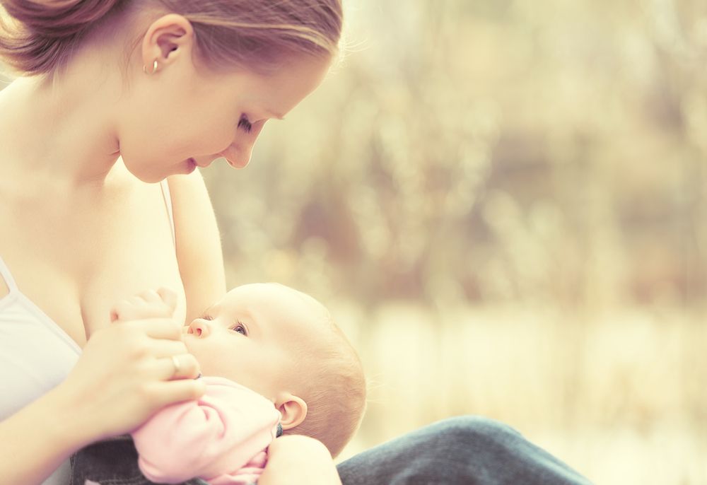 Breastfeeding.,Mother,Feeding,Her,Baby,In,Nature,Outdoors,In,The