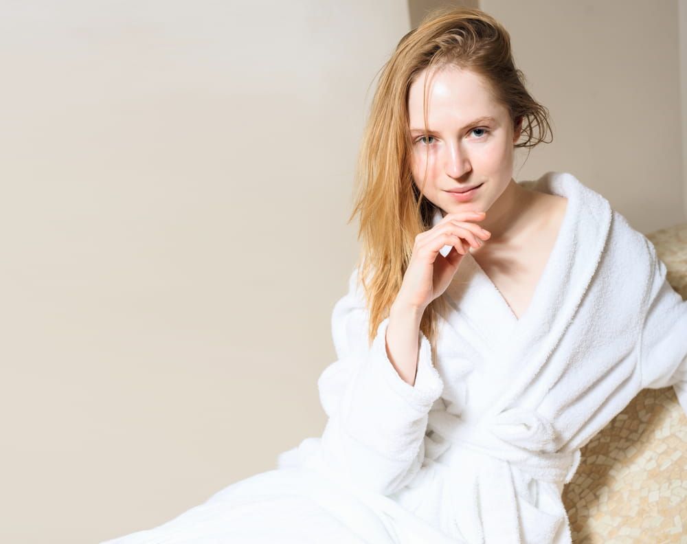 Spa Woman. Beautiful Girl After Bath Perfect Skin. Skincare. Young Skin