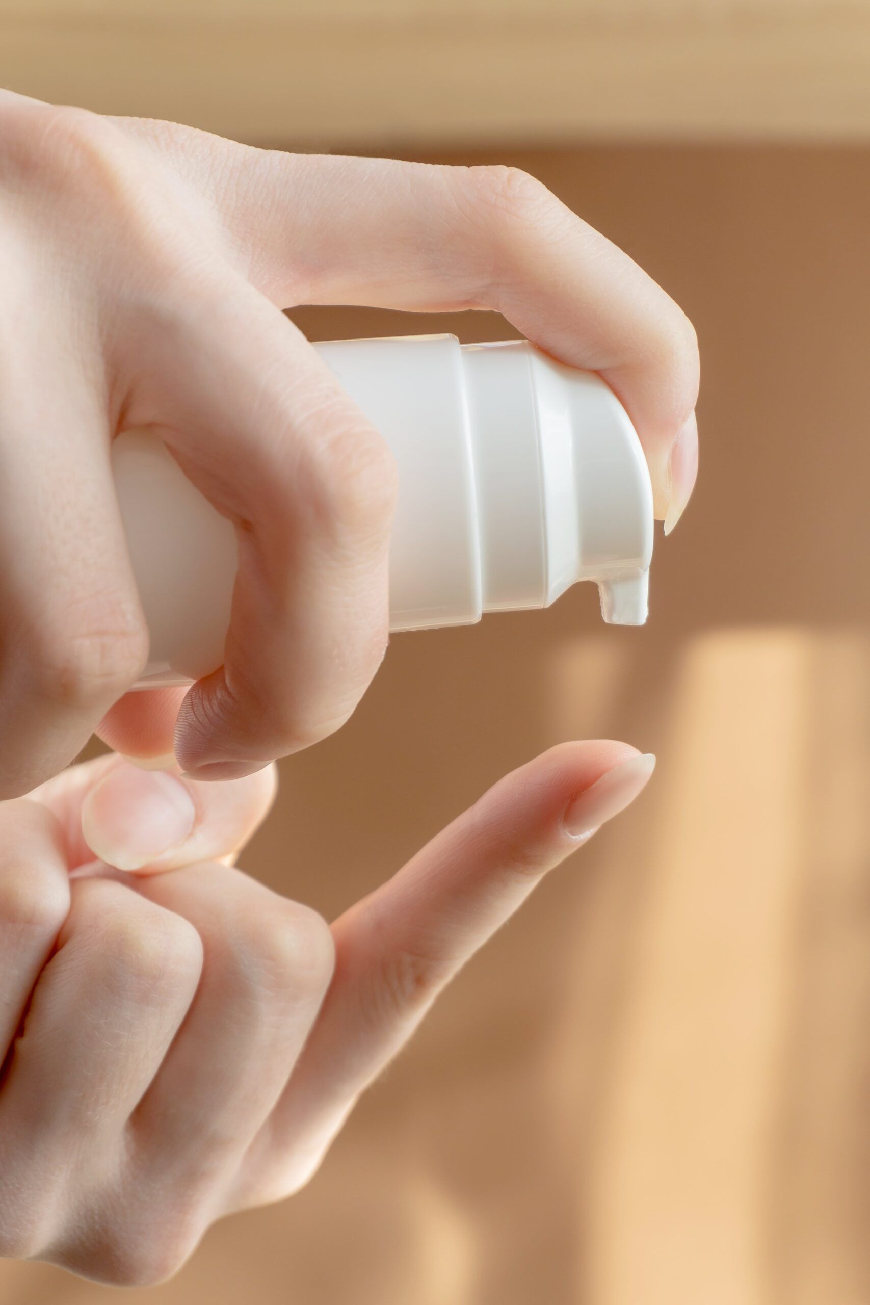 woman's hand squeezing foam
