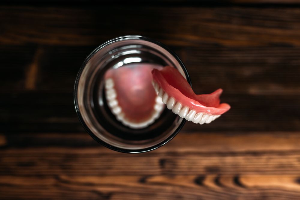 Dentures in a glass water