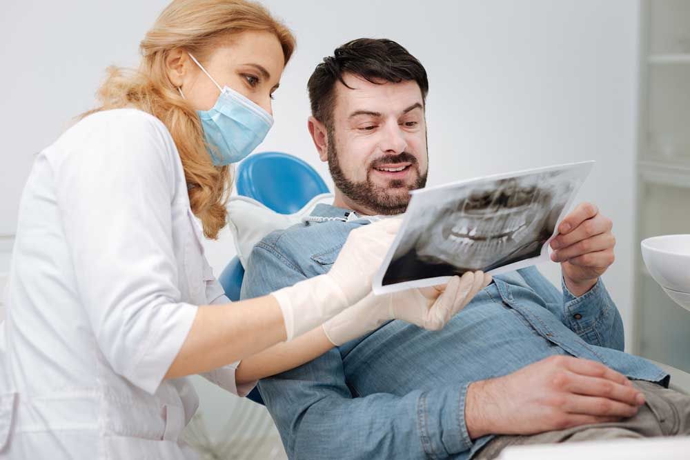 Motivated admirable dentist having some good news