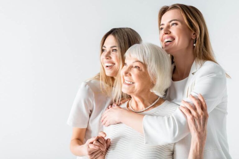 three generation of positive women smiling