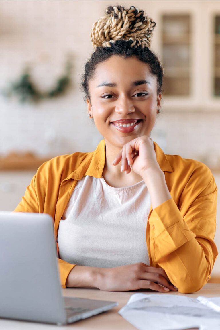 Satisfied good looking young woman