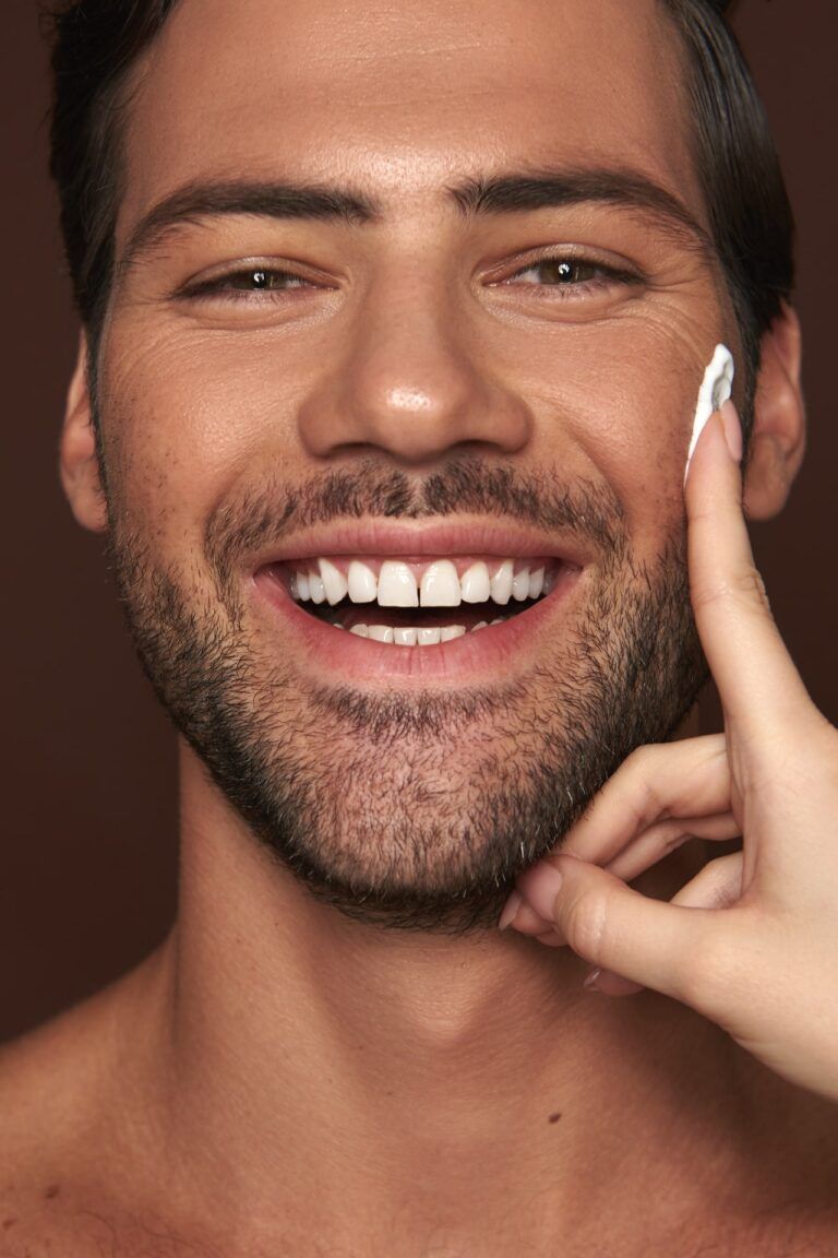 young handsome man after beauty procedure and skin care