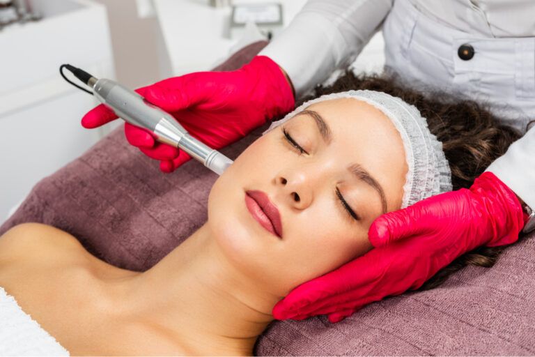 woman receiving microneedling rejuvenation treatment