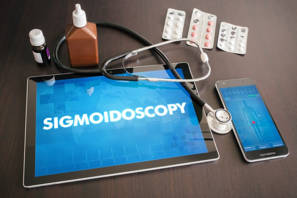 Sigmoidoscopy written on tablet screen with stethoscope