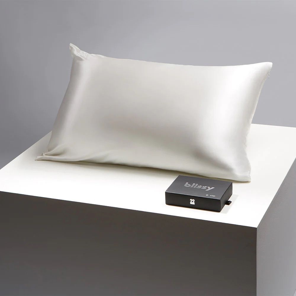 A pillow and a black box