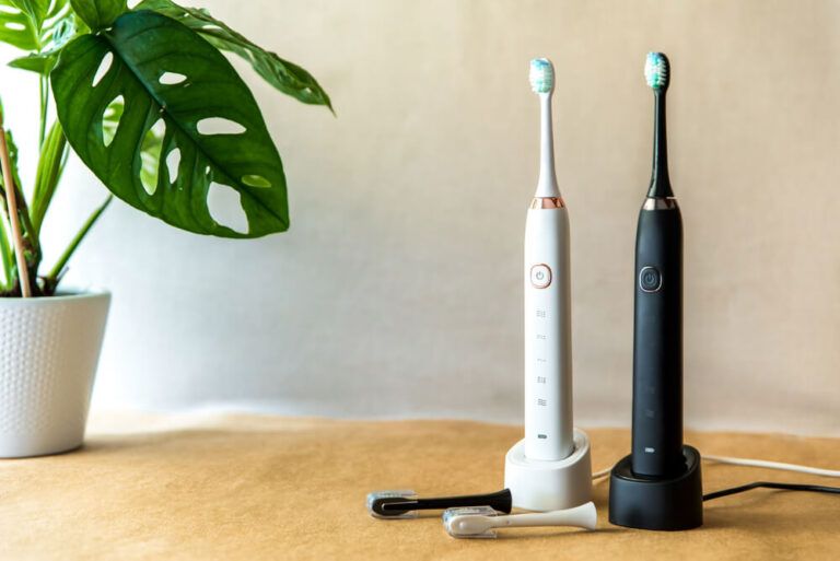 electric toothbrush set with charger in bathroom