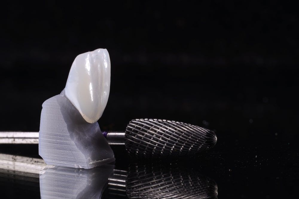 Dental Gingival Retraction Cord with dental carbide burr and a dental crown