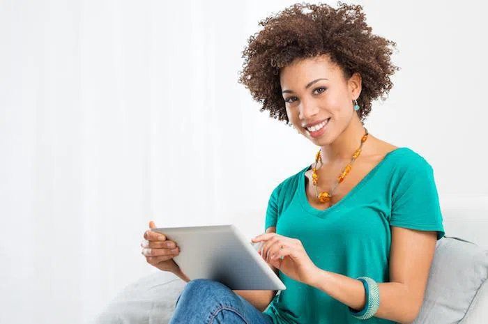 African American woman using tablet