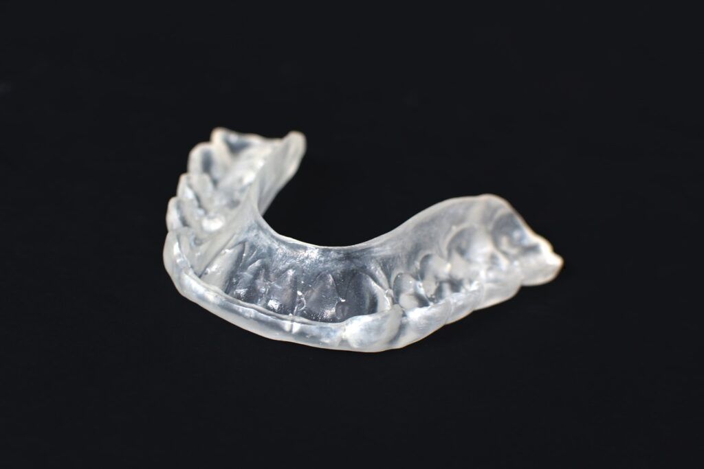 occlusal splint isolated on a black background