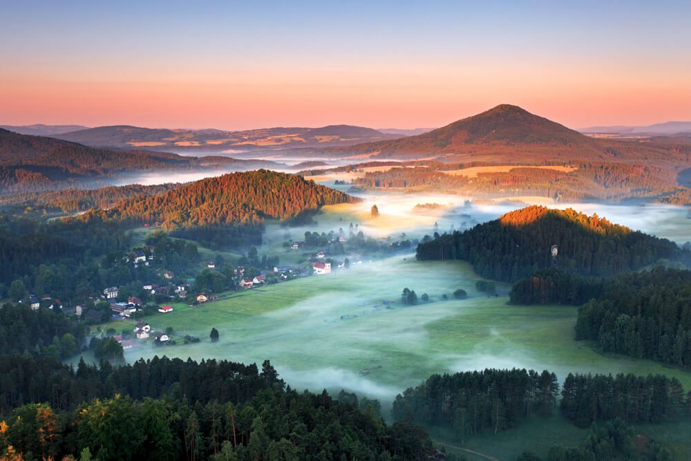 Sunrise in beautiful mountain Czech switzerland with inversion