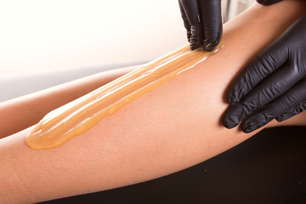 Hair removal process on female leg with epilation