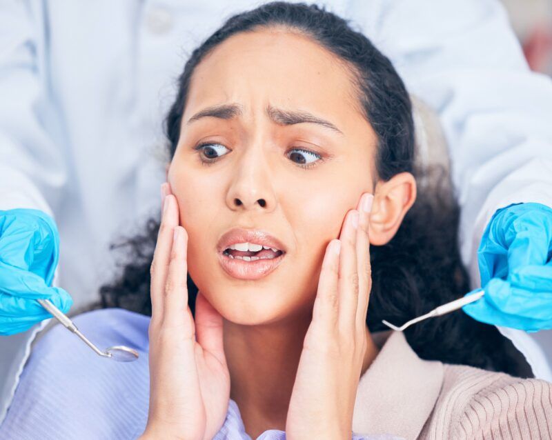 Young Woman Who is Afraid of the Dentist