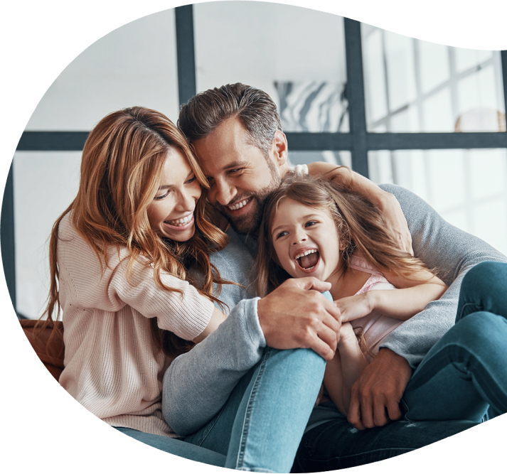 Couple with their daughter smiling