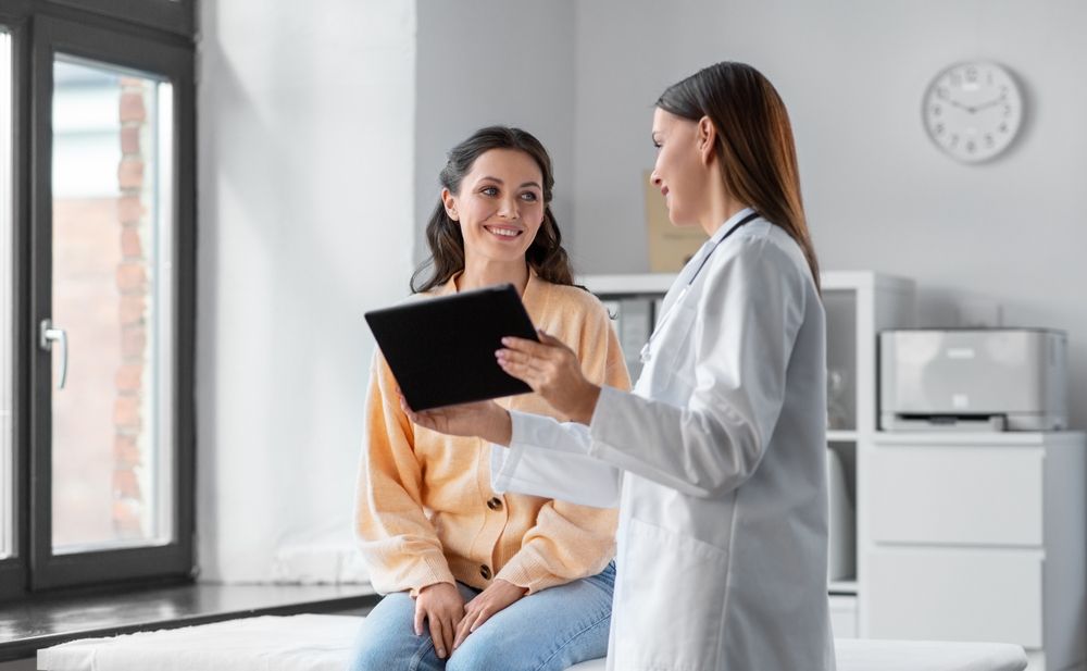 Female Doctor With Tablet